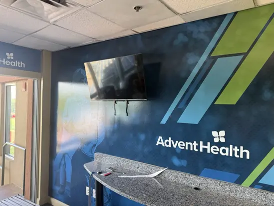 Completed indoor wall graphics and brand mural for AdventHealth