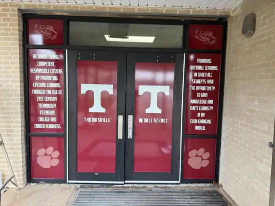 Finished school entryway graphics with no people visible