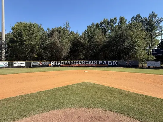 Completed field-side sponsor banners at Shades Mountain Park