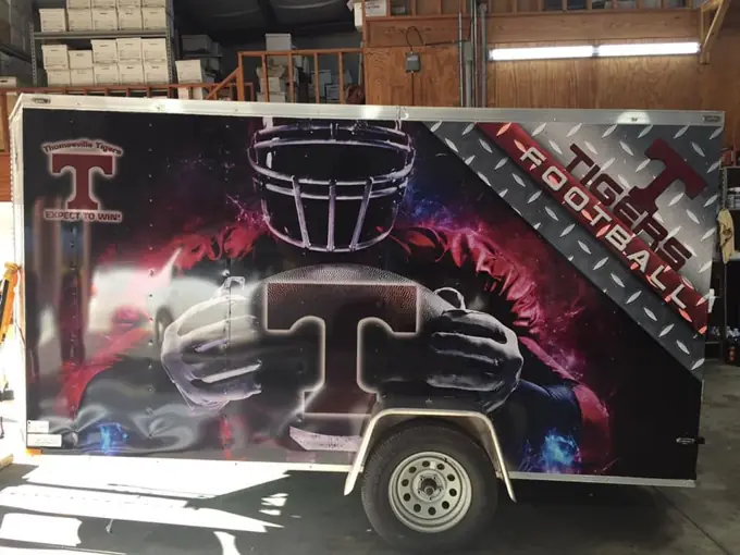 Wrapped Thomasville Tigers high school football equipment trailer